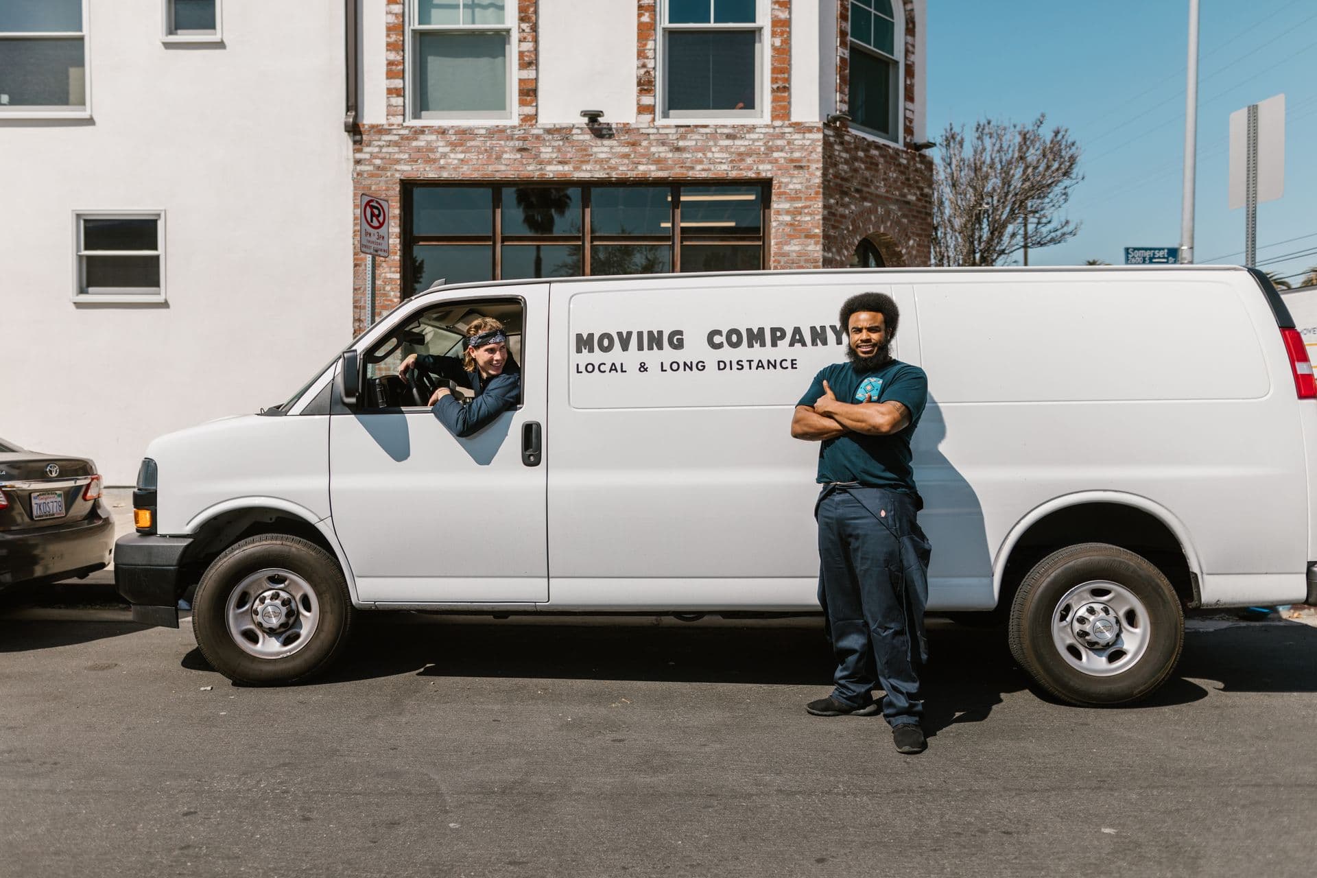 Professional man and van team ready for a collection